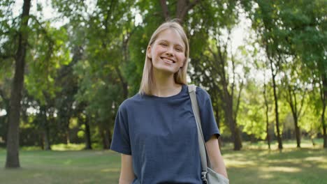 woman smiling in a park
