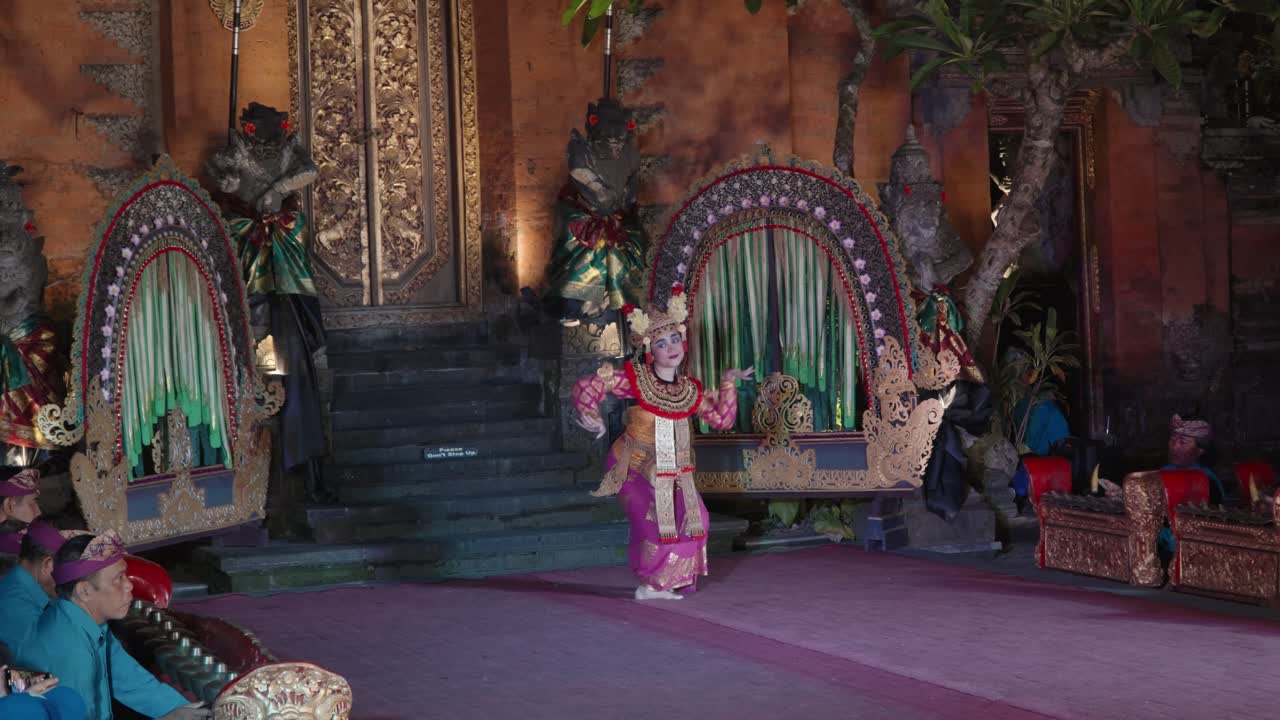 One Woman Dancing Legong and Ramayana Traditional Theater Dance Performance at Night in Ubud Palace, Bali