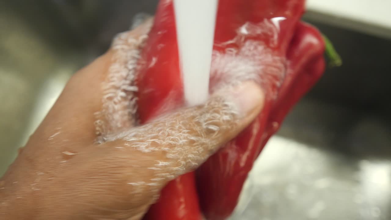 Washing Red Bell Peppers