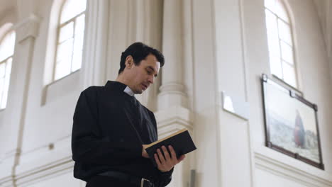 man reading the holy book