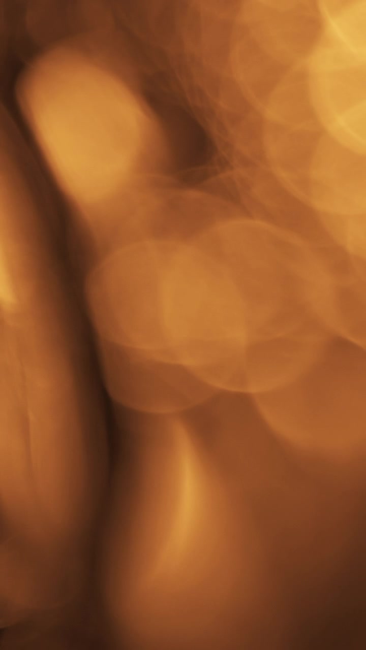 Abstract La luce dorata Bokeh sullo sfondo