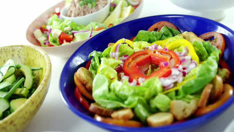 variation of salads in bowl