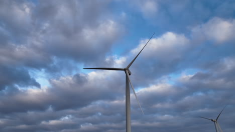 single solitary wind turbine with an amazing moody