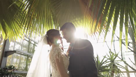 Newlyweds.-Caucasian-groom-with-bride-in-the-park.-Wedding-couple.-Happy-family