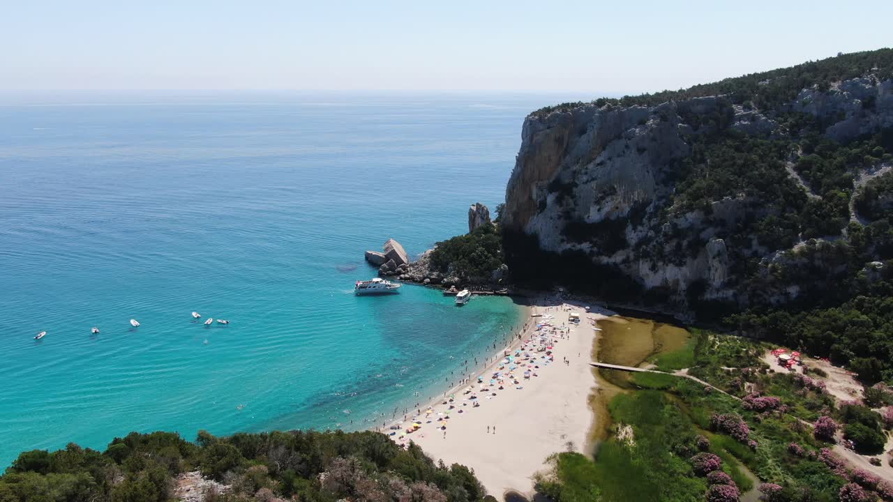 Aerial view of the beach, pan left