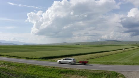 Agricultural-Fields-And-County-Road-Between-Communes-Of-Sansimion-And-Sanmartin-In-Harghita-County,-Romania