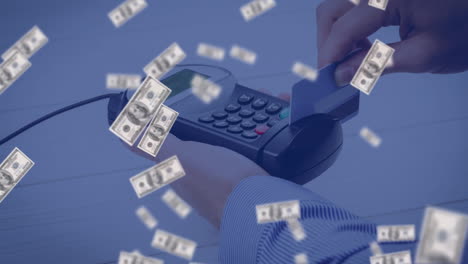 animation of american dollar bills falling over payment terminal