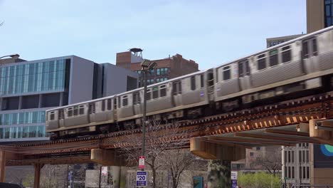 an el train passes through downtown chicago illinois 3