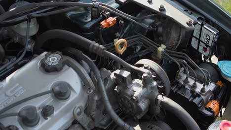 ENGINE-CLEANING-AND-TUNE-UP-DONE-BY-MECHANIC-UNDER-SHADE-AND-FIXING-MINOR-PROBLEMS