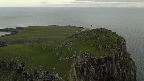 An-aerial,-evening-view-of-Neist-Point-Lighthouse-on-the-Isle-of-Skye