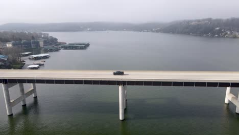 Car-Commuting-on-Highway-Bridge-Road-Crossing-Ozarks-Lake,-Missouri,-Aerial