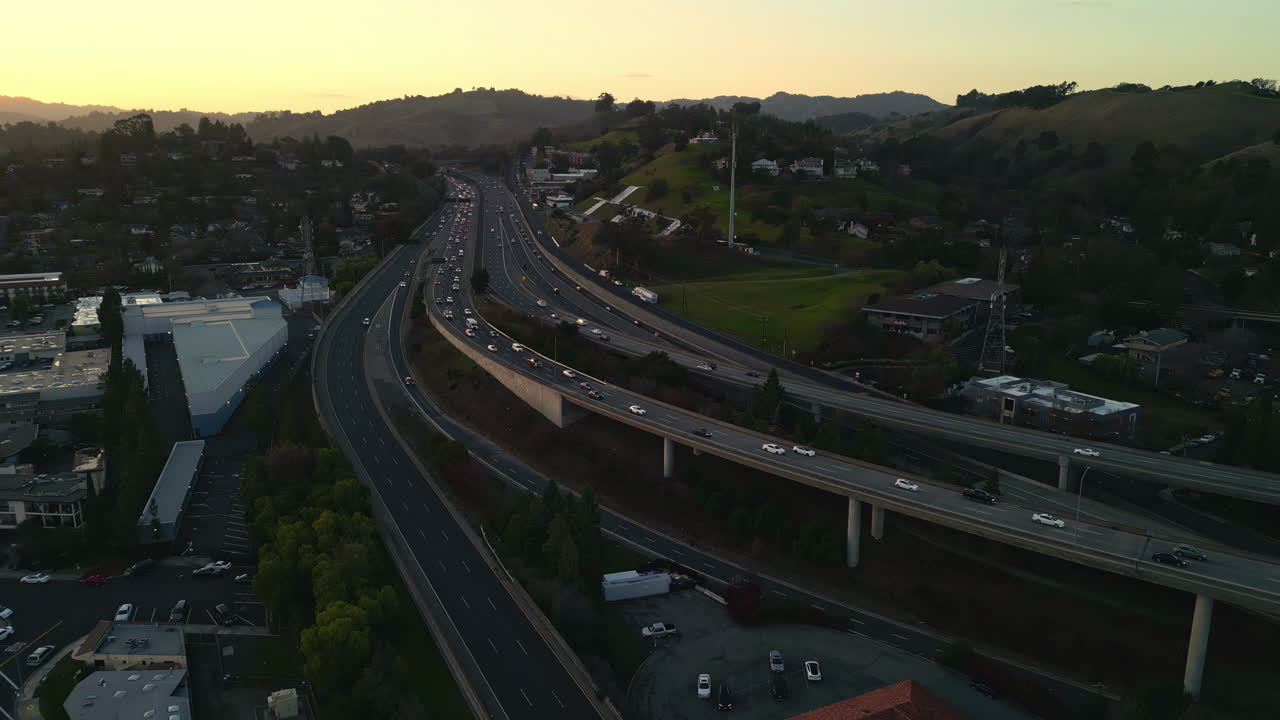 Aerial view of highway in the outskirts of San Francisco. Sunset