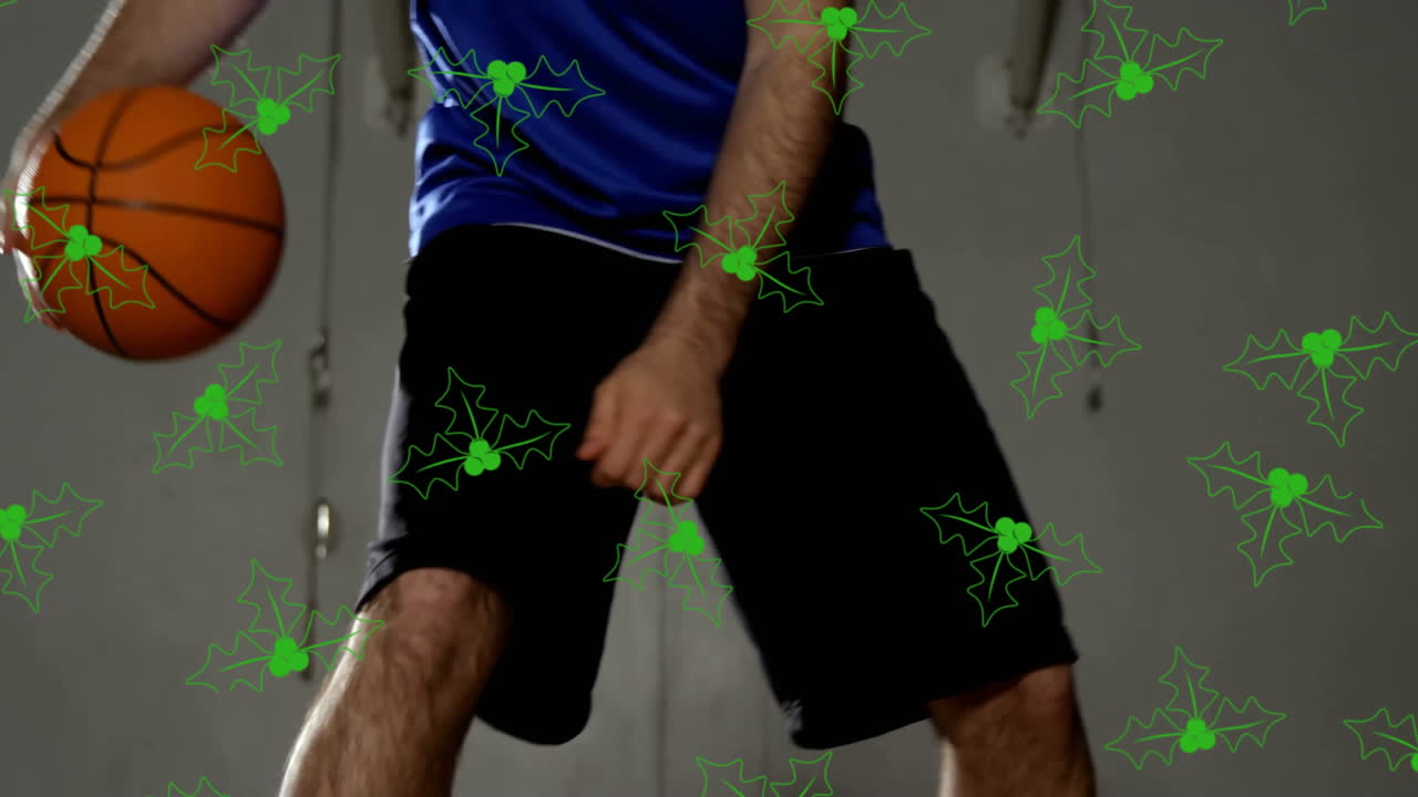 Dribbling basketball, person with green holly leaf animation overlay on screen