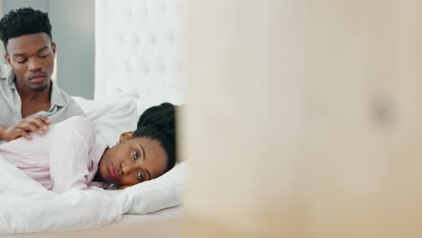 Couple-in-bedroom-after-fight