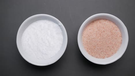 white and pink salt in small bowls