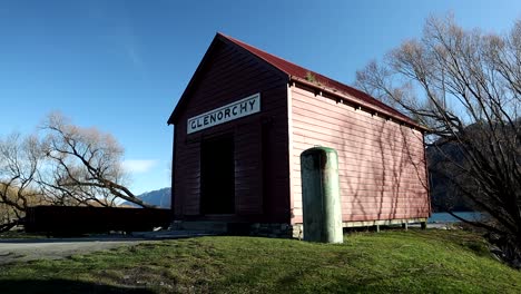 glenorchy queenstown new zealand famous red shed panning right to left on sunset