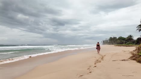 walking alone on paradise tropical beach, nature sandy shore mental health walk