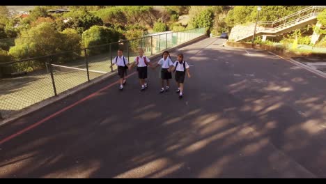 school kids walking in campus