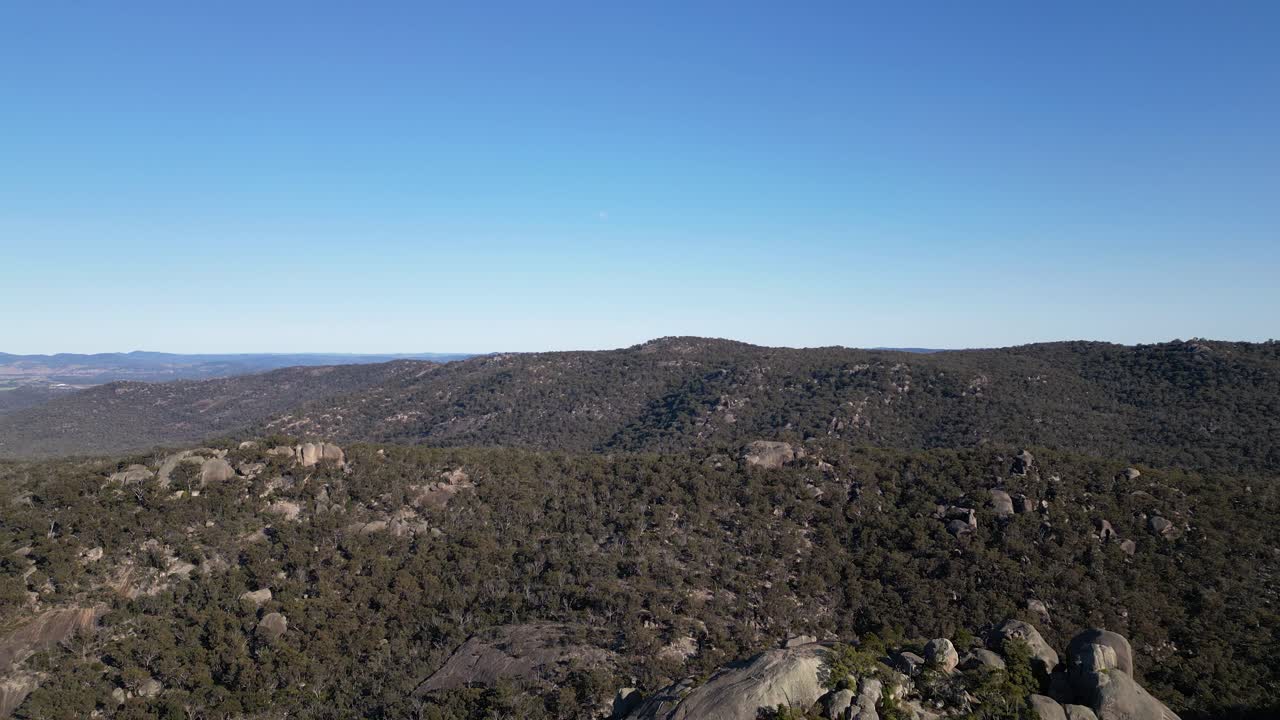 Reversing aerial footage over the Pyramid, Girraween National Park, Southern Queensland Australia. Girraween National Park is located near Stanthorpe and the Queensland and New South Wales border.