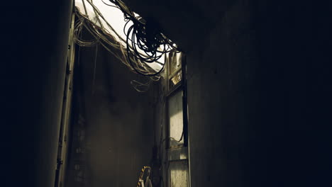 abandoned building interior with exposed wires