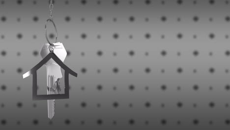 House-shaped-keychain-and-keys-animation-on-polka-dot-background