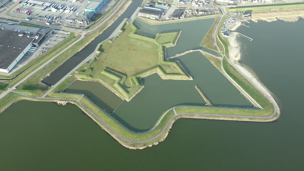 Aerial View of a Historical Fortress and Surrounding Industrial Area