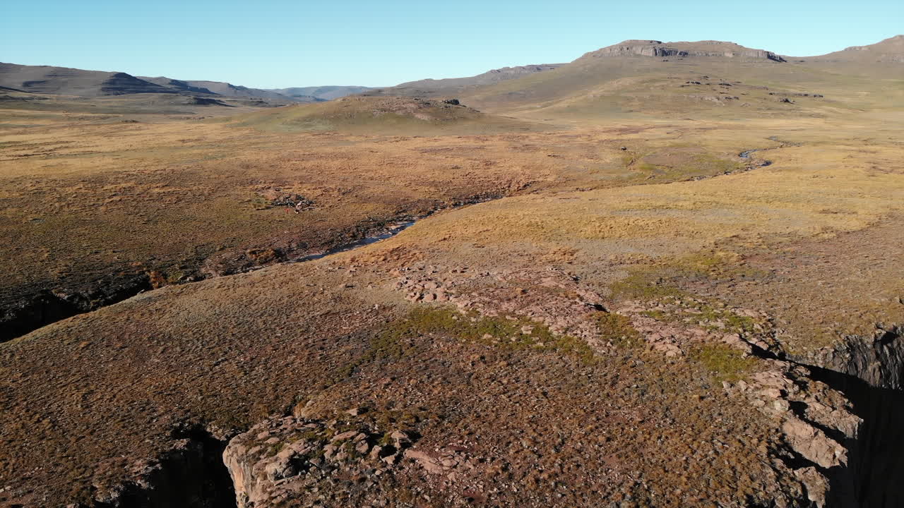 Aerial View of Mountainous Landscape with Valley and River