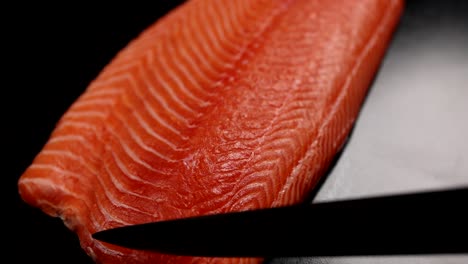 slicing fresh salmon