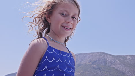 small girl enjoying a yacht in greece