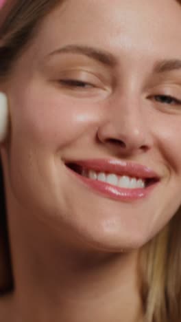 woman applying makeup