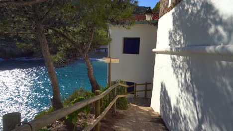 european-beach-in-mediterranean-spain-white-houses-calm-sea-turquoise-blue-begur-costa-brava-ibiza