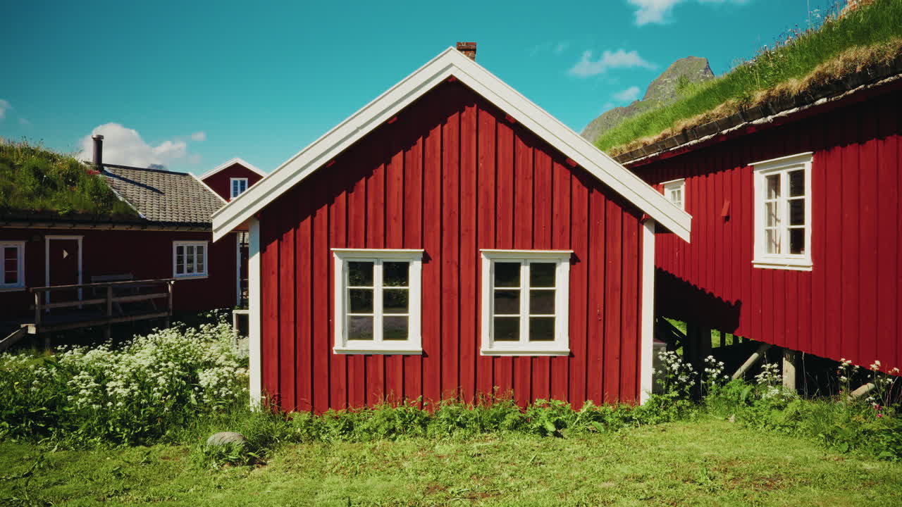 Static shot of the red wooden fishermen cabins in the Lofoten islands, Norway.