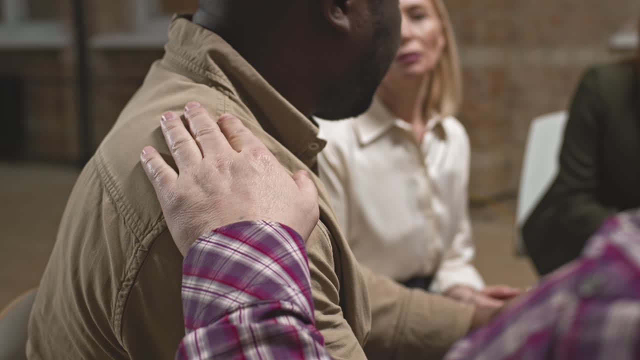 People Supporting Each Other at Group Therapy Session