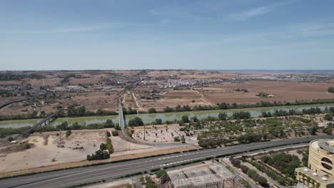 Drone-flying-above-the-famous-Guadalquivir-River-in-the-center-of-Seville-City