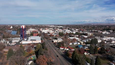 drone shot panning to the left of downtown idaho falls with the water town