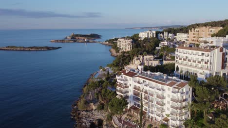 Hotel-buildings-and-private-beach-on-Palma-de-Mallorca-coastline-in-Spain,-drone