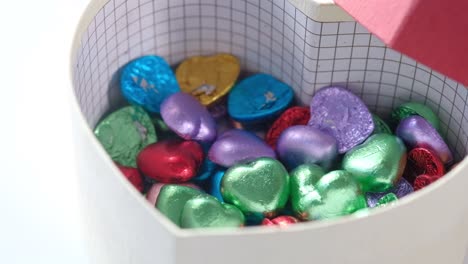 heart-shaped chocolates in a heart-shaped box