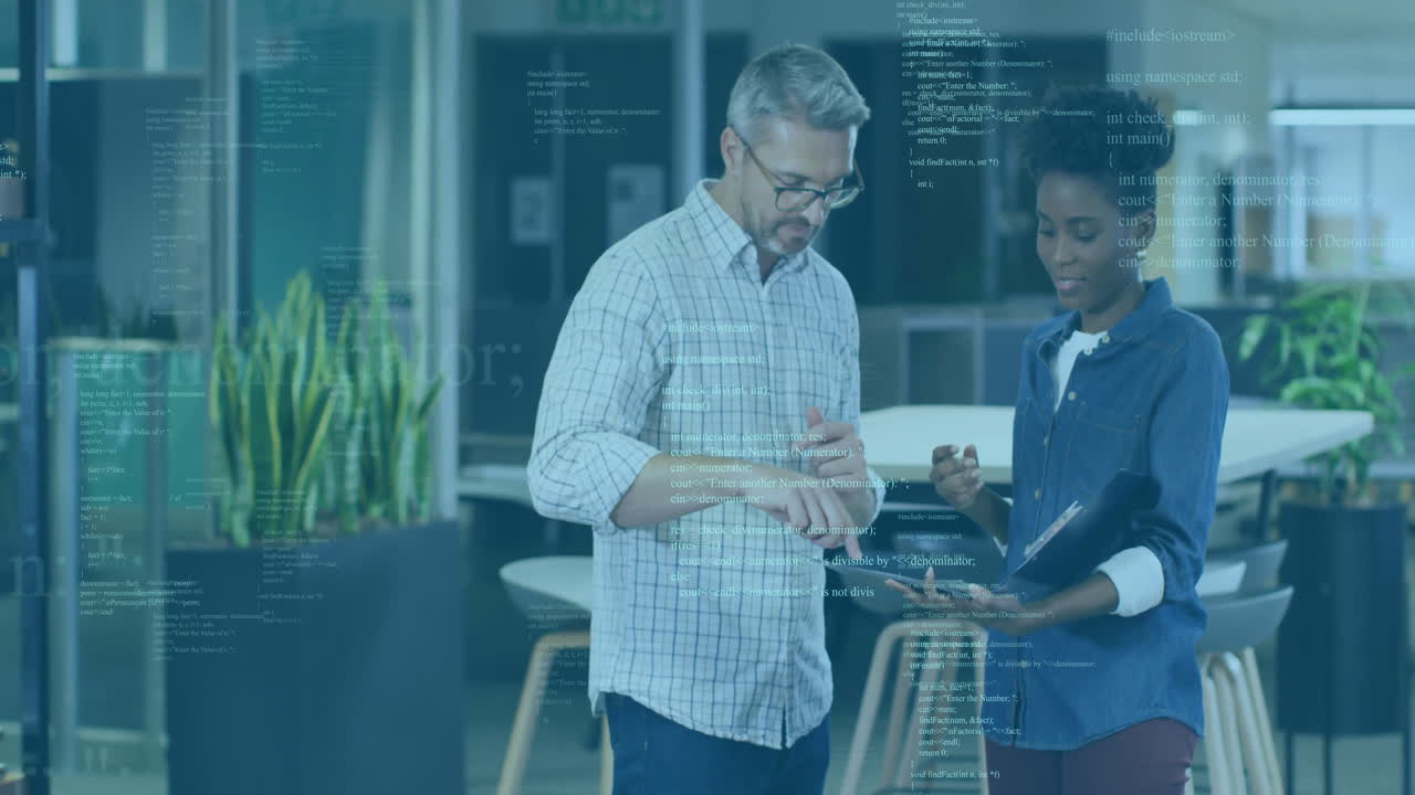 Discussing work in modern office, professionals with code overlay and animation