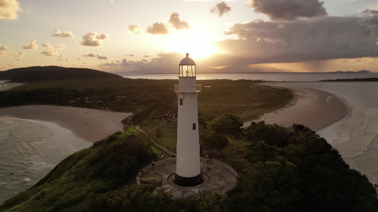 Aerial view at sunset of the Farol das Conchas lighthouse and beaches of Ilha do Mel, Paranagu&aacute;, Paran&aacute;, South, Brazil