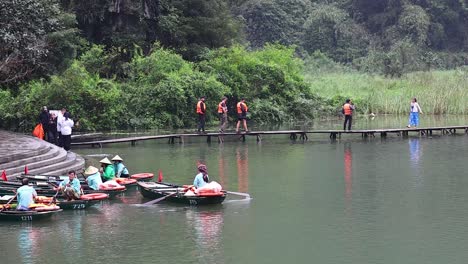 tourists enjoy a scenic row boat ride