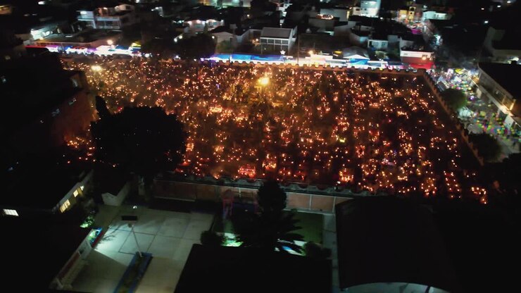 Flying over the Mixquic cemetery, Day of the Dead, candlelight like the movie Coco