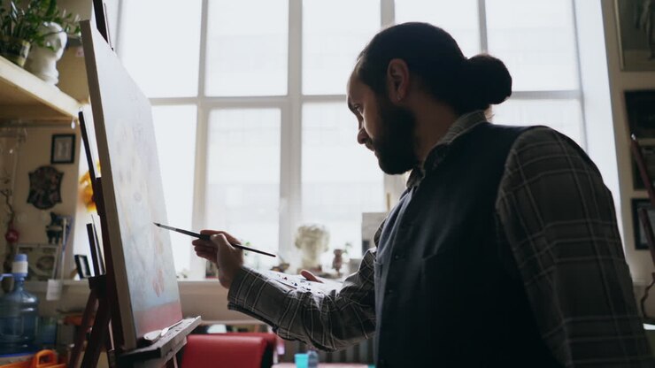 Artist Painting in Studio