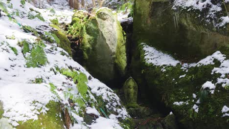 Moss-covered-Jizo-Statue-in-the-Forest-Mountain-at-Yamadera,-Japanese-Temple