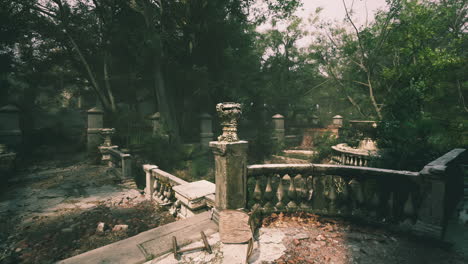 abandoned garden area with crumbling stone walls and lush greenery
