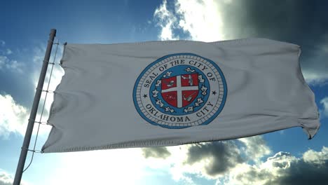 flag of oklahoma, city of united states of america, waving at wind in blue sky