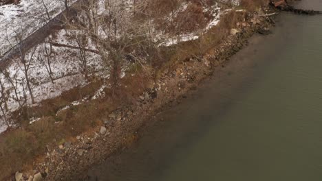 An-aerial-view-over-Coney-Island-Creek-by-Calvert-Vaux-Park-on-a-cold-winter-morning