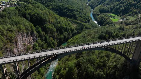 high-angle view of a bridge over a mountain river