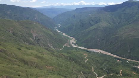 Aerial-View-of-Chicamocha-River-Canyon,-Natural-Landmark-of-Colombia-on-Sunny-Day,-Drone-Shot