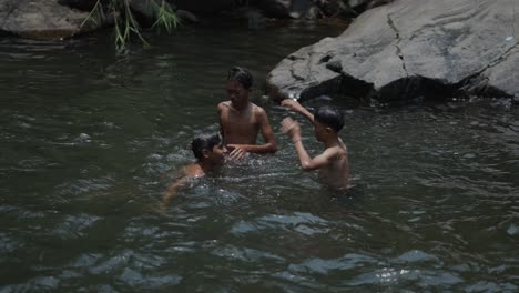 children playing in a river