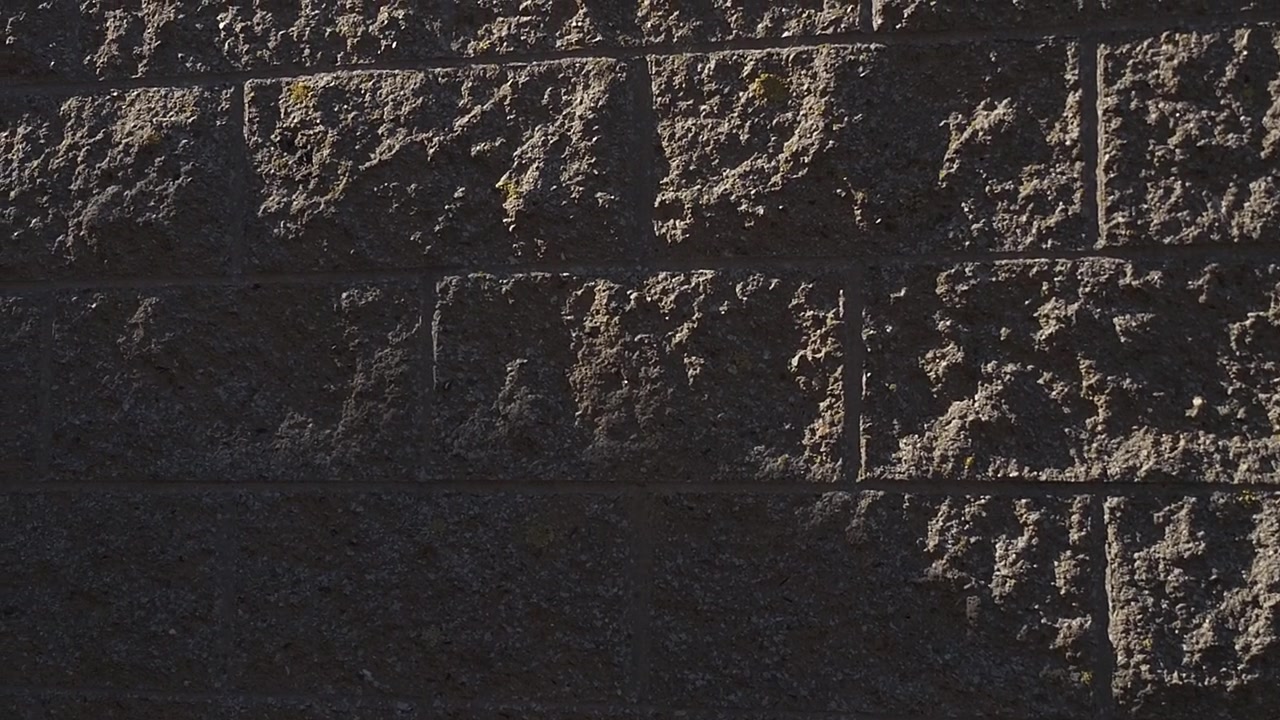Video astratto di un muro in pietra per sfondo